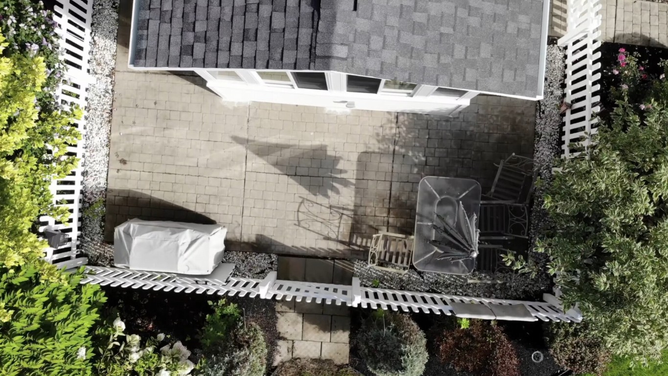 Aerial view of patio enclosure with custom pavers in Gainesville, FL